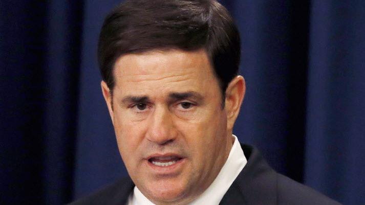 Ducey defends call to halt all refugee resettlements